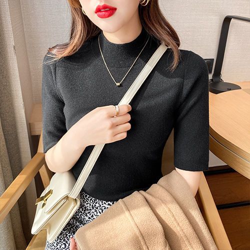 Inner layer of the top is a thin knitted sweater.