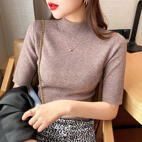 Inner layer of the top is a thin knitted sweater.