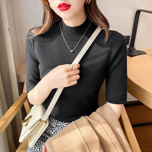 Inner layer of the top is a thin knitted sweater.
